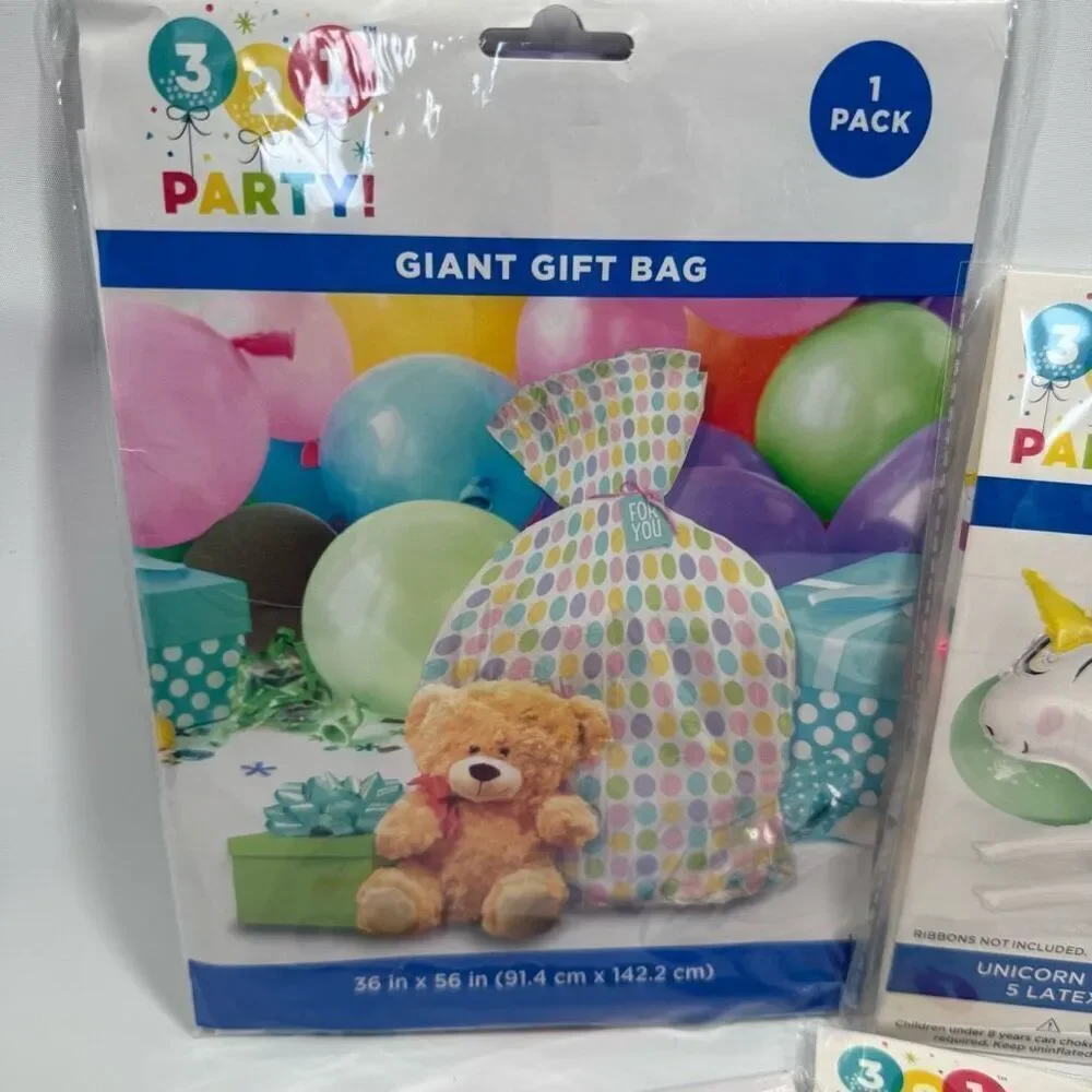 D37. Party Decorations- 4 piece It’s a girl baby shower balloons and large gift